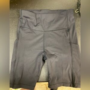 Athleta ultimate stash pocket shorts 7” size: Small Black